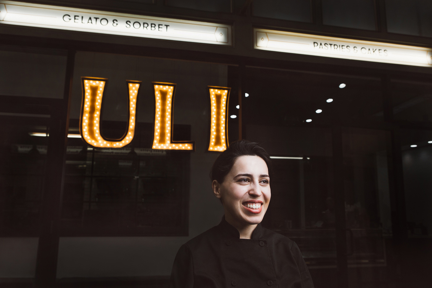 woman in front of store window