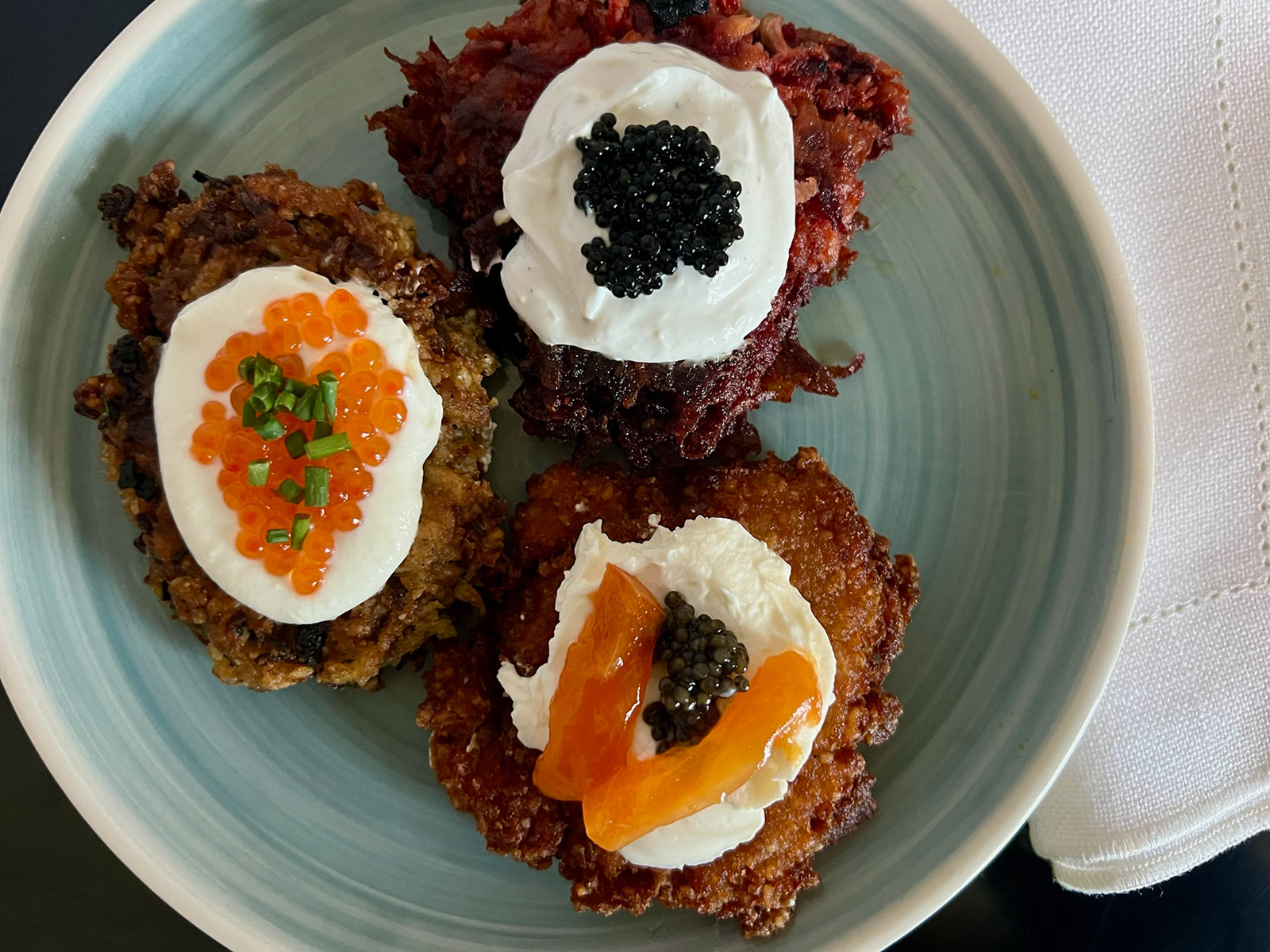 beet + sweet potato latke with horseradish sour cream caviar