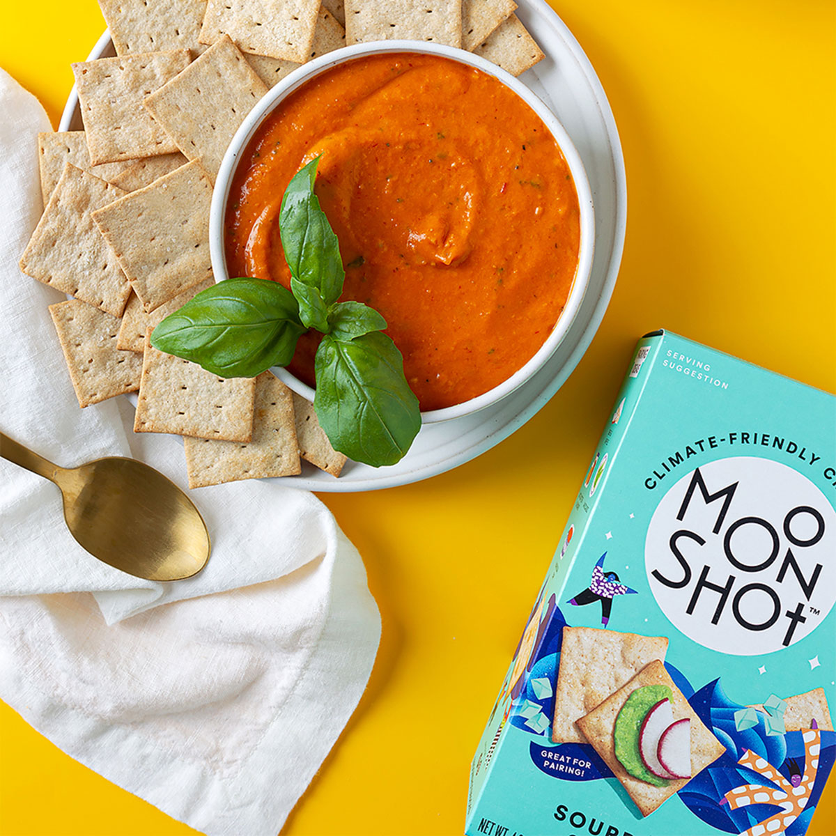 Bowl of tomato soup with crackers