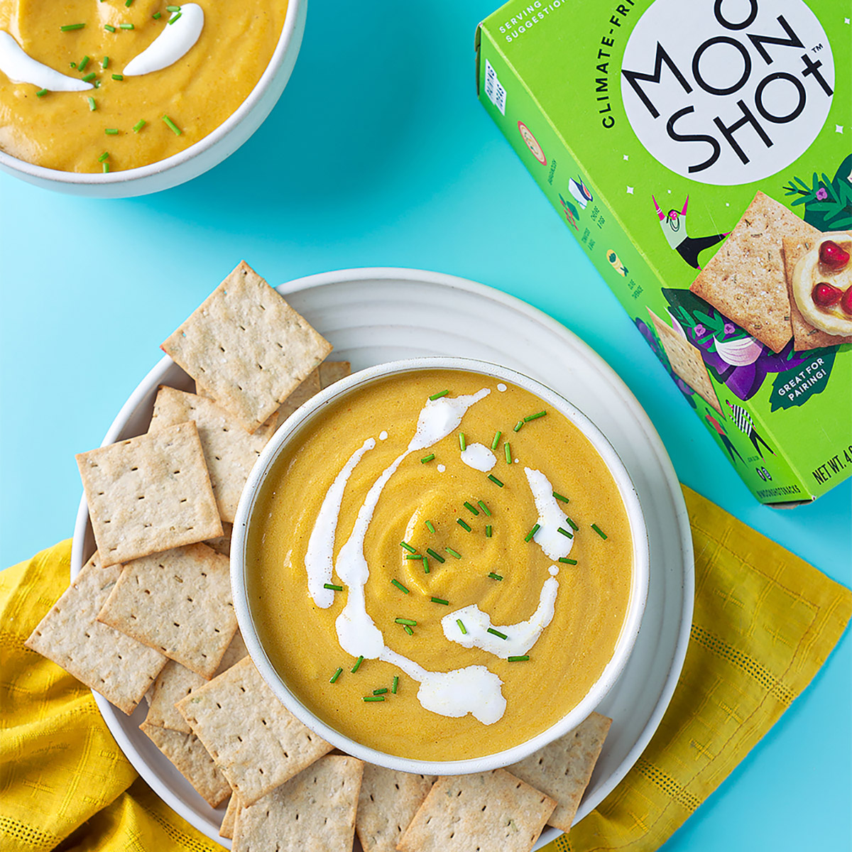 Bowl of Moonshot crackers and avocado salad