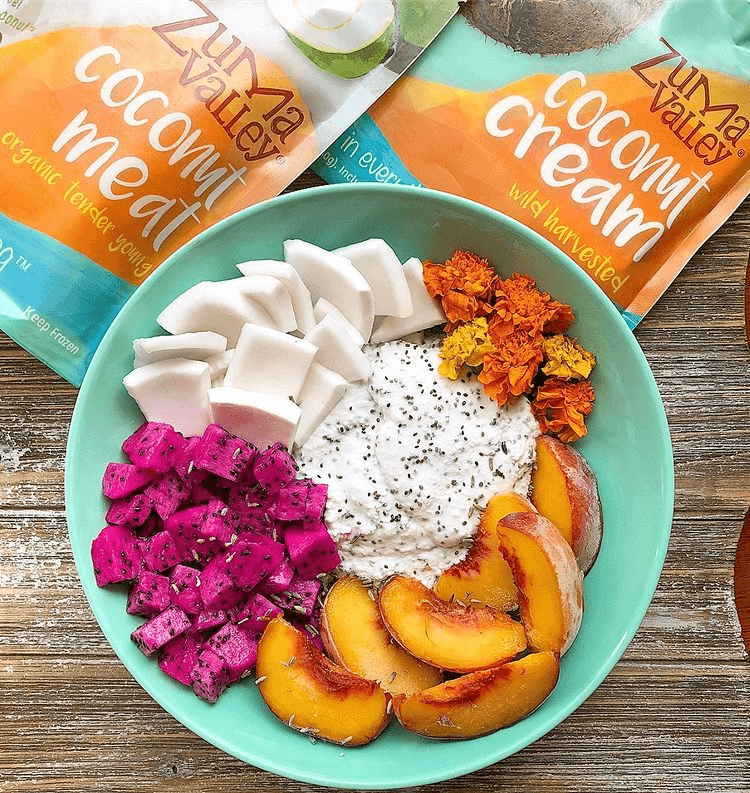 Fruit bowl made with coconut cream and meat