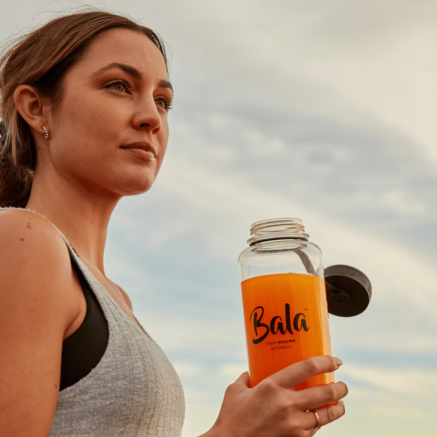 girl holding Bala bottle