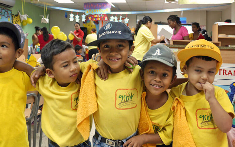 Children wearing GROW shirts