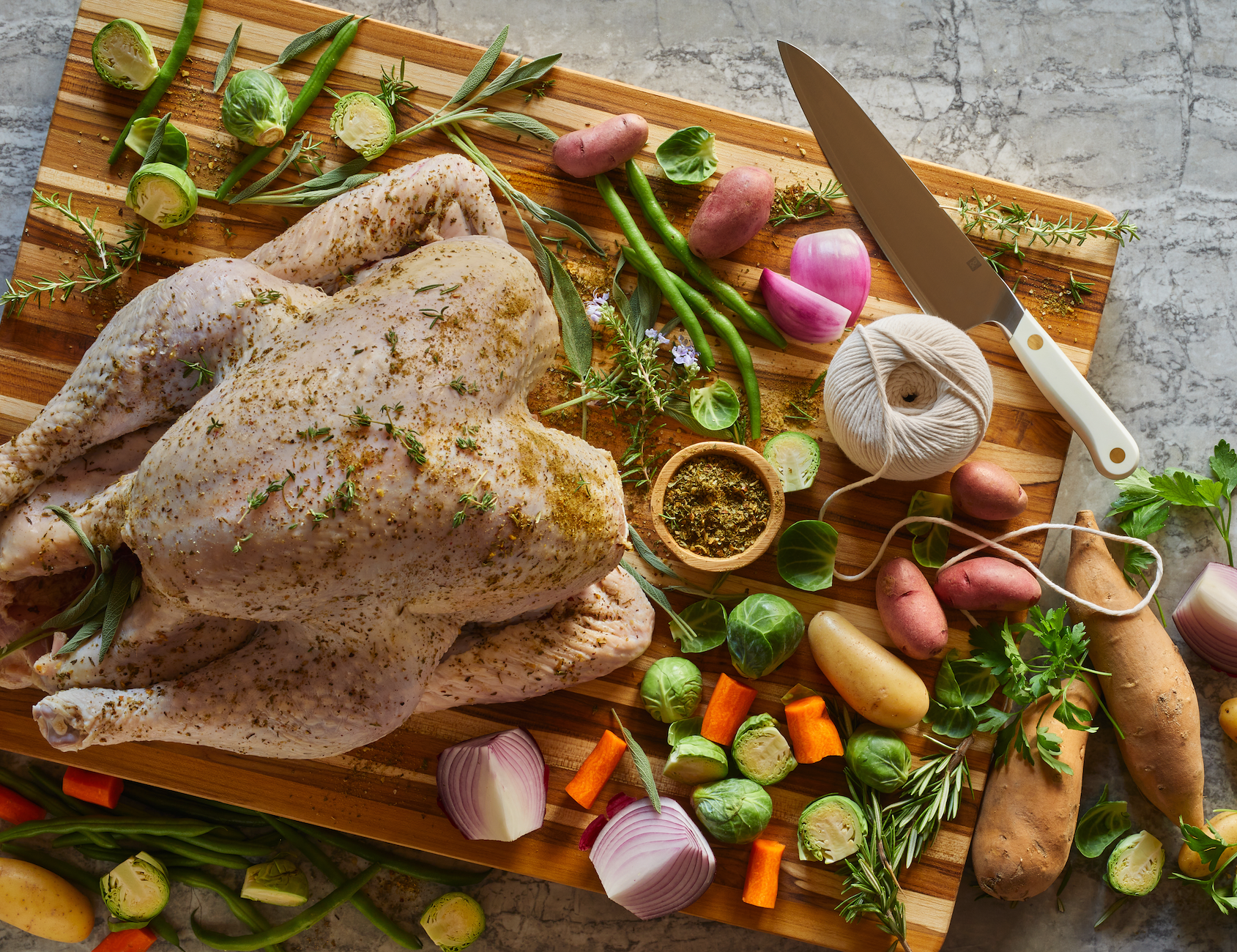 Raw turkey on cutting board