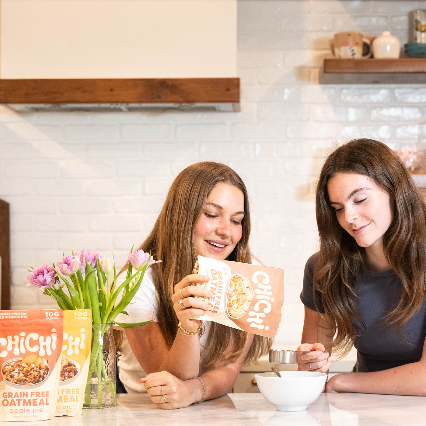 Two girls about to eat some ChiChi grain free oatmeal