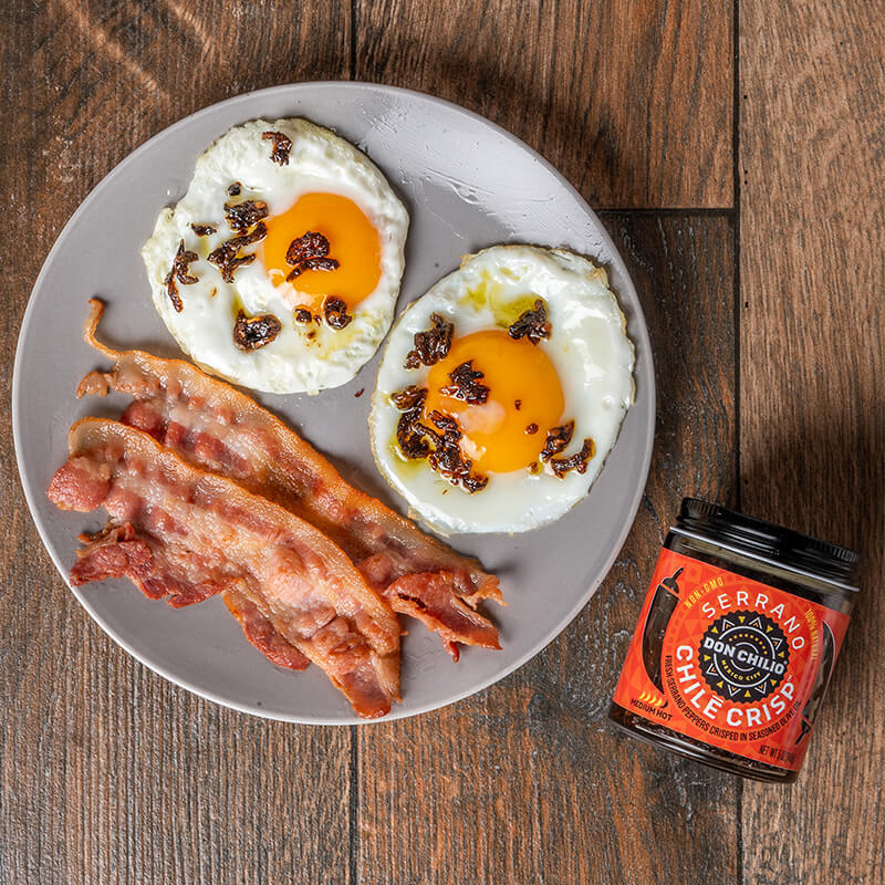 Eggs and bacon with serrano chile crisp 