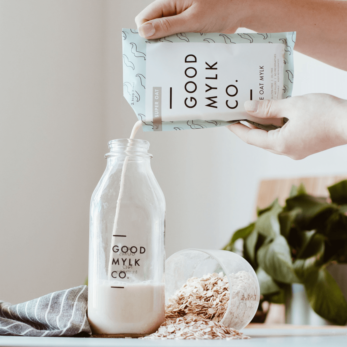 Goodmylk being poured into a bottle