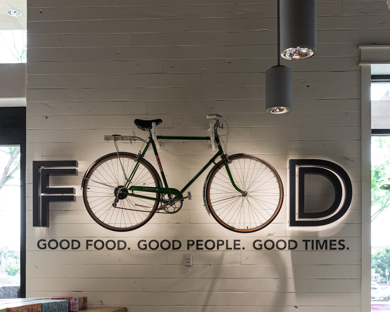 Bristol Farms Product aisle with employee standing infront