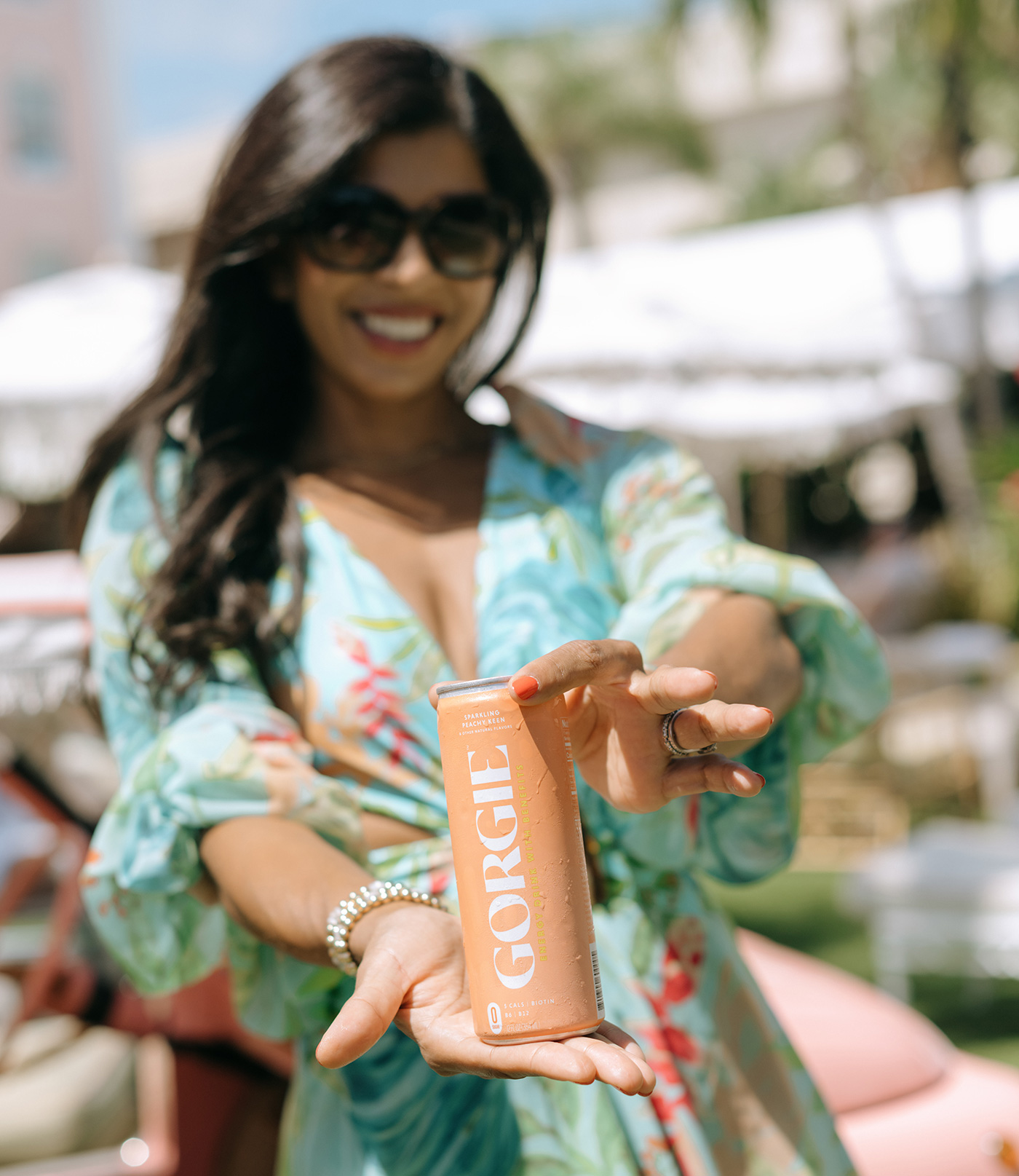 Woman holding GORGIE beverage