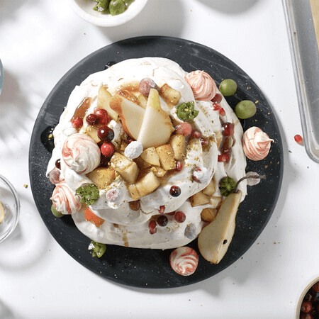 Holiday Pavlova with Pears, Kiwi Berries, and Cranberries