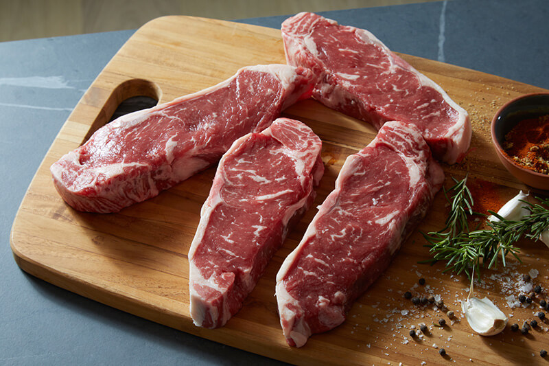 ny strip steaks with compound butter