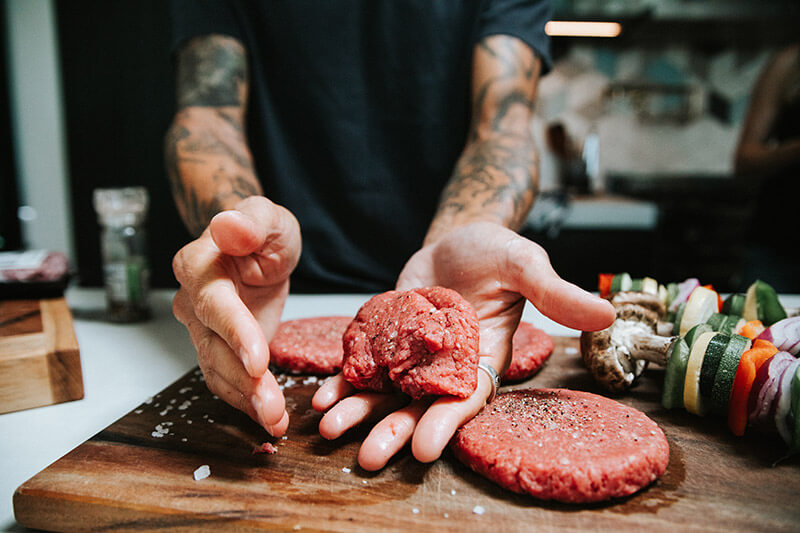 Man making hamburger