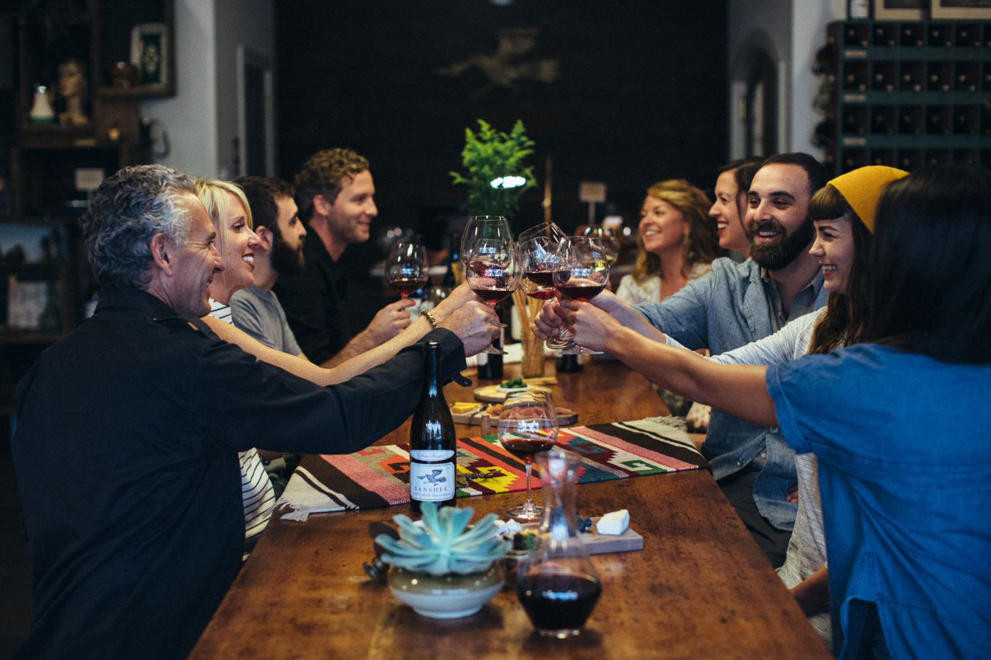 Family enjoying wine together