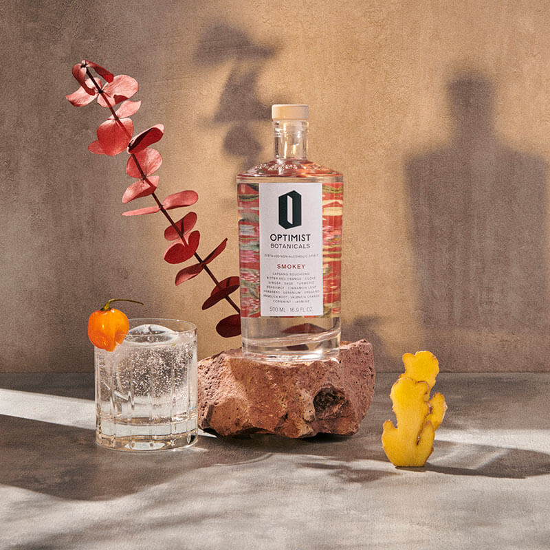 Bottle and glass of Optimist alcohol