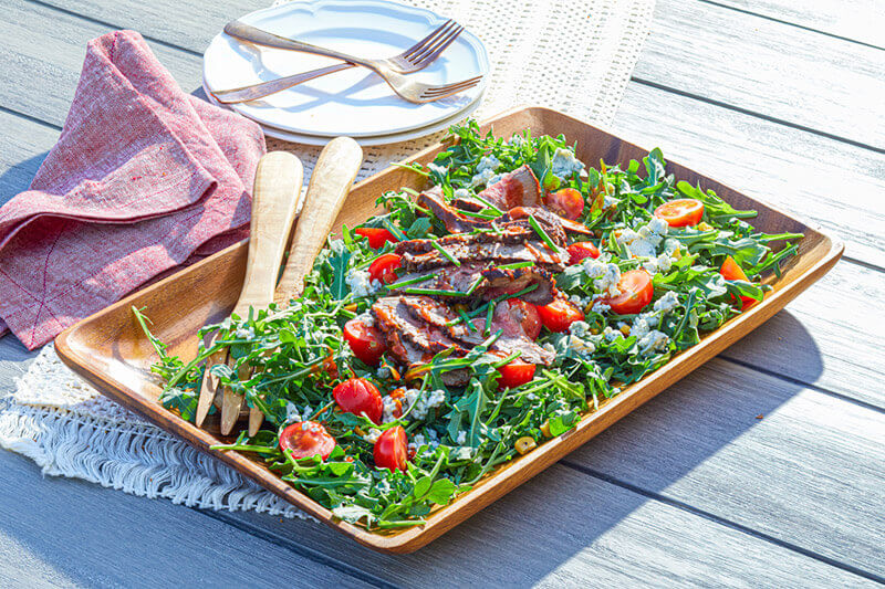 Sliced Tri Tip over a salad