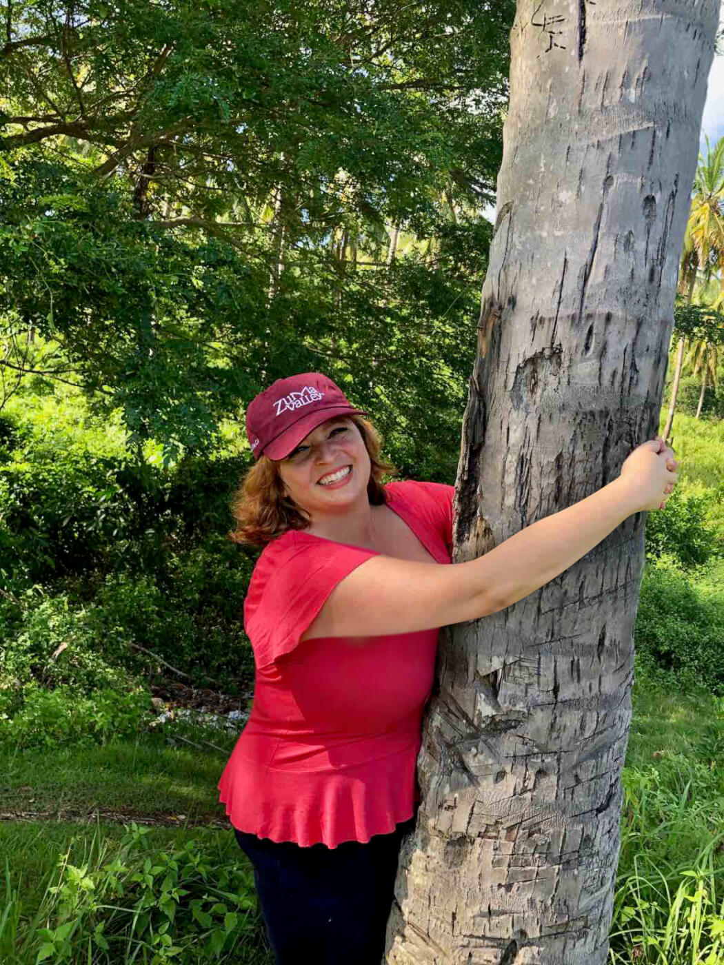 Founder Julie Labin hugging a tree 