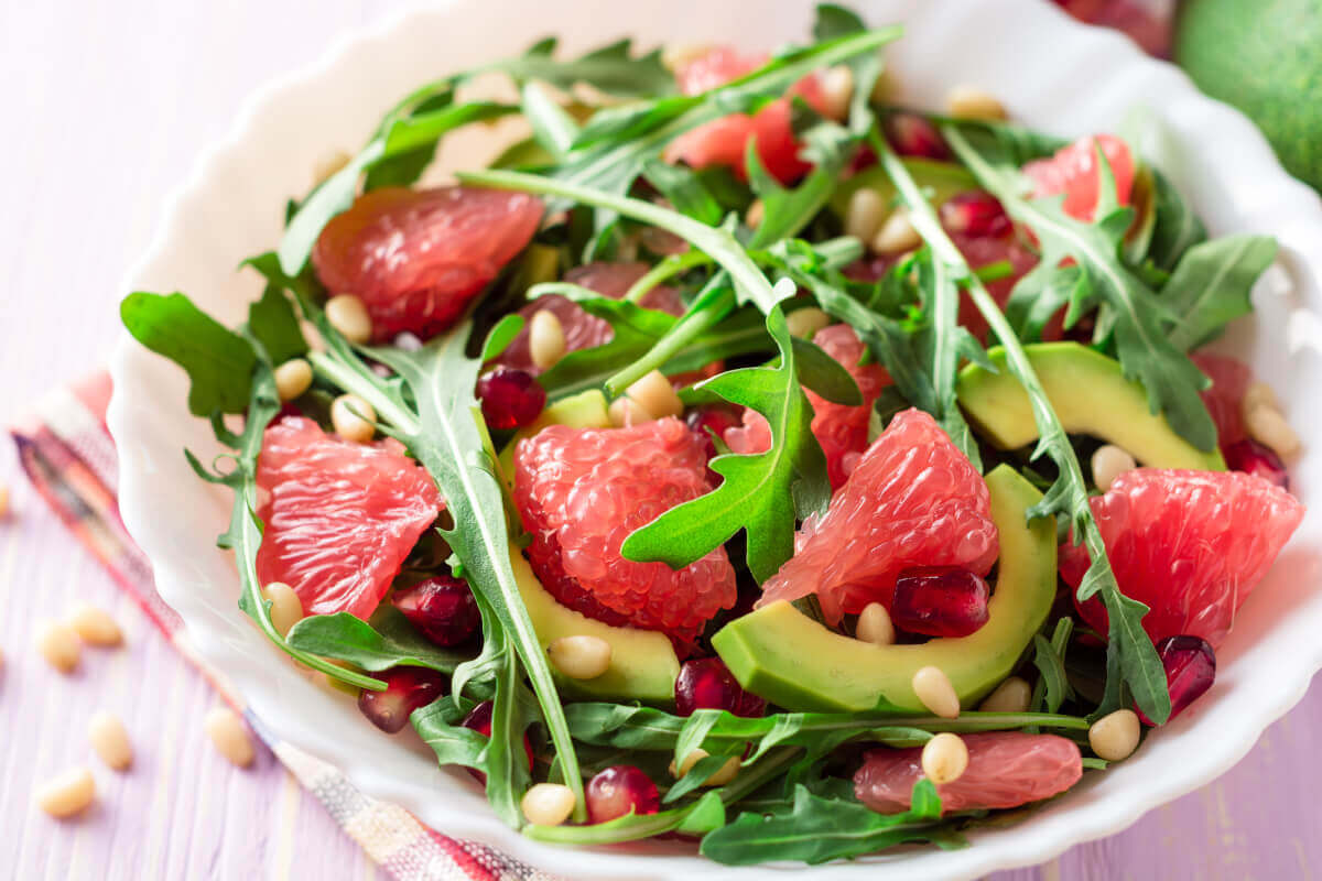 bowl of mixed salad with grapefruit