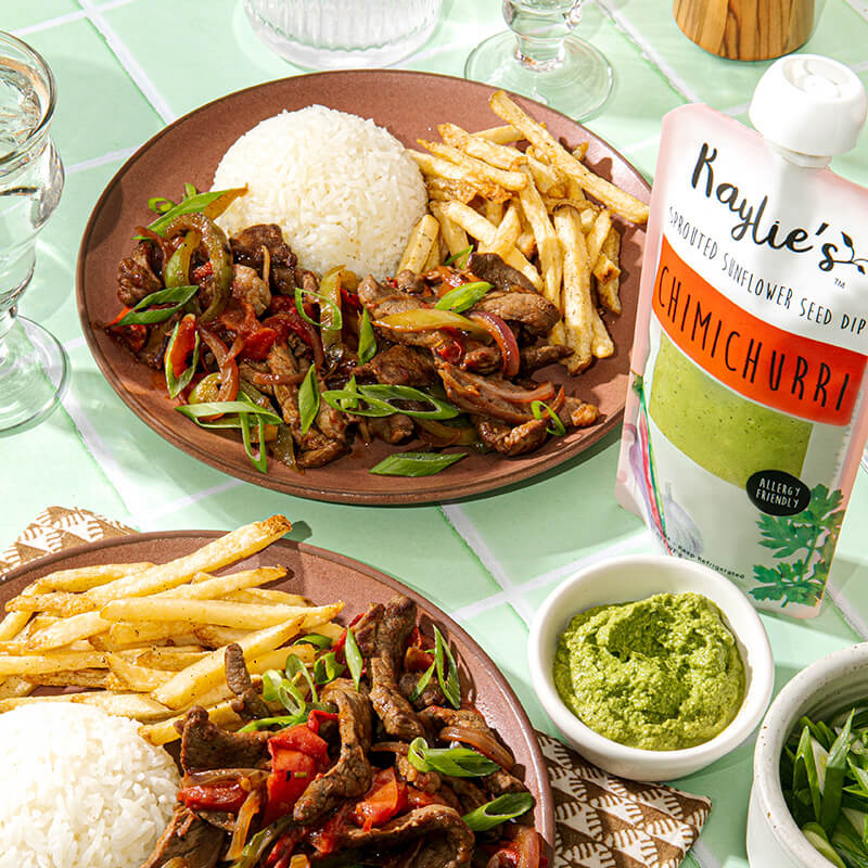 Rice, steak, and fries and chimichurri sauce