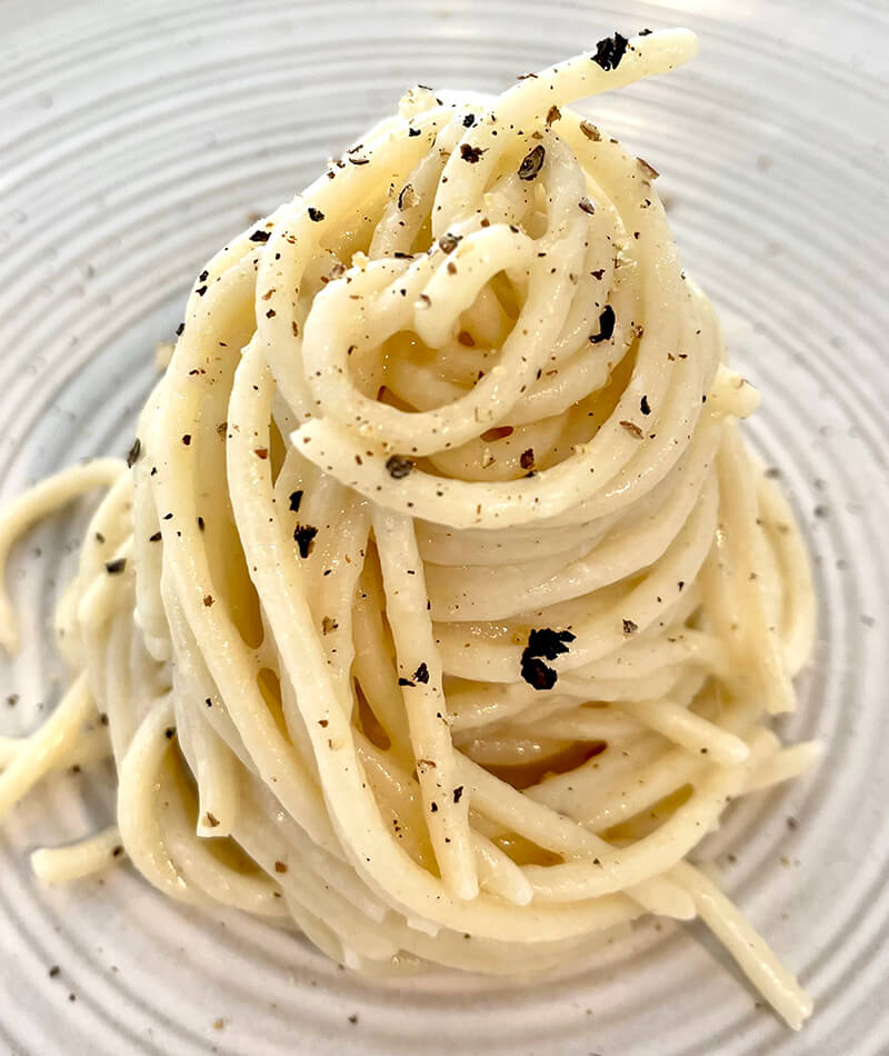 Pasta made with cacio e pepe flavored butter